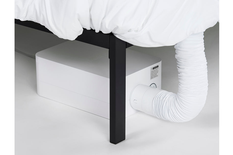 a BedJet unit placed underneath a bedframe