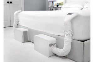 two BedJet units installed at the foot of a bed